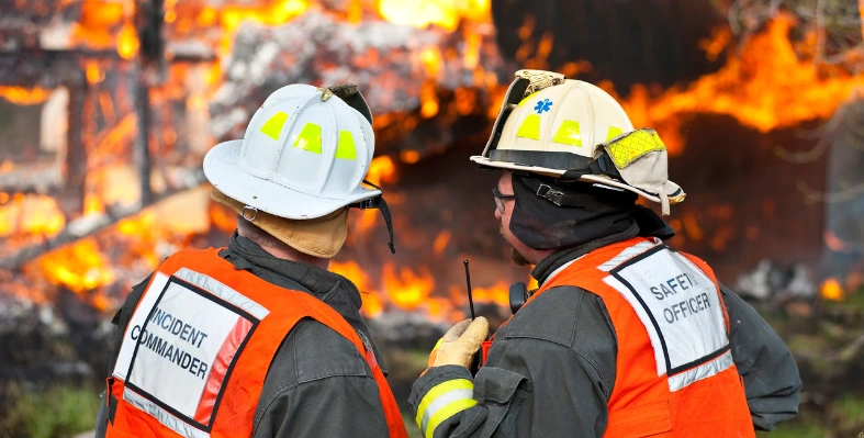 Firefighters at a site overseeing firefighting efforts