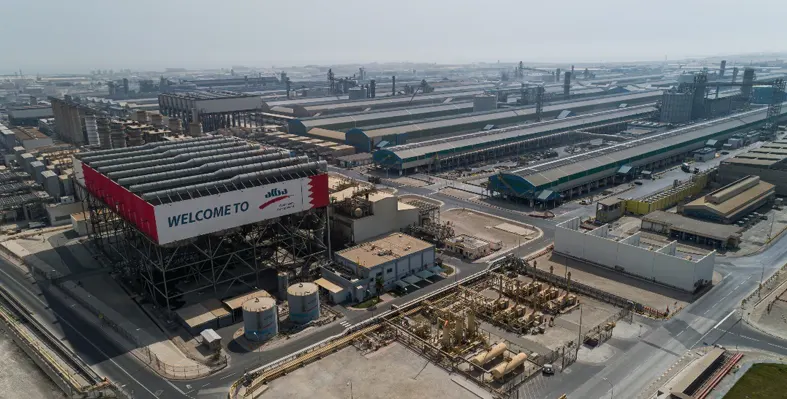 Aerial shot of Aluminium Bahrain facility with warehouses and tanks