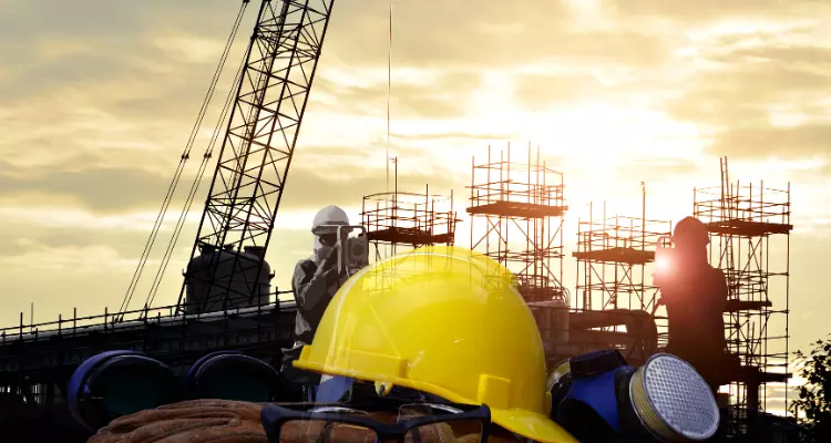 Image of hard hats and construction.