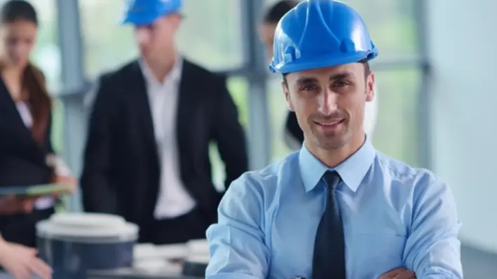 three_workers_wearing_blue_hard_hats