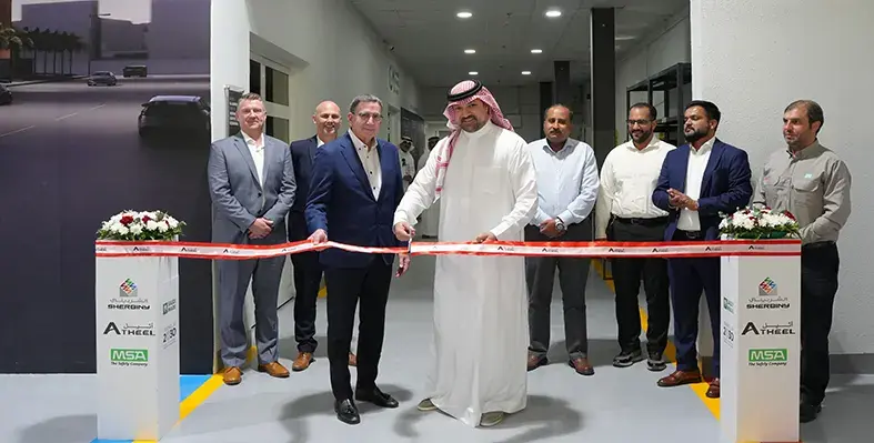 Executives_at_ribbon_cutting_ceremony_for_Sherbiny_facility