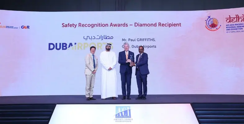 Mr Paul Griffiths, CEO of DXB, accepting the award on stage.