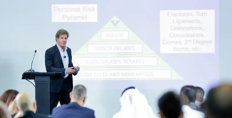 Larry Wilson, founder of SafeSmart International, on stage at the HSE KSA Conference in Riyadh, Saudi Arabia.