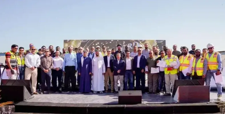  Engineer Abdulla Saeed Al Shamsi and workers from Jubail Island celebrating the commemoration of 12 million man hours without an LTI.