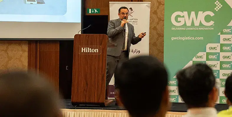 a_man_speaking_on_the_stage