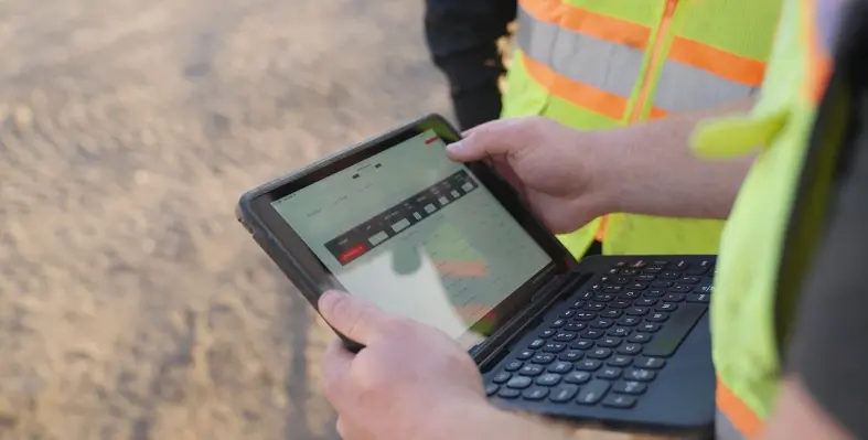 a_person_holding_a_tablet